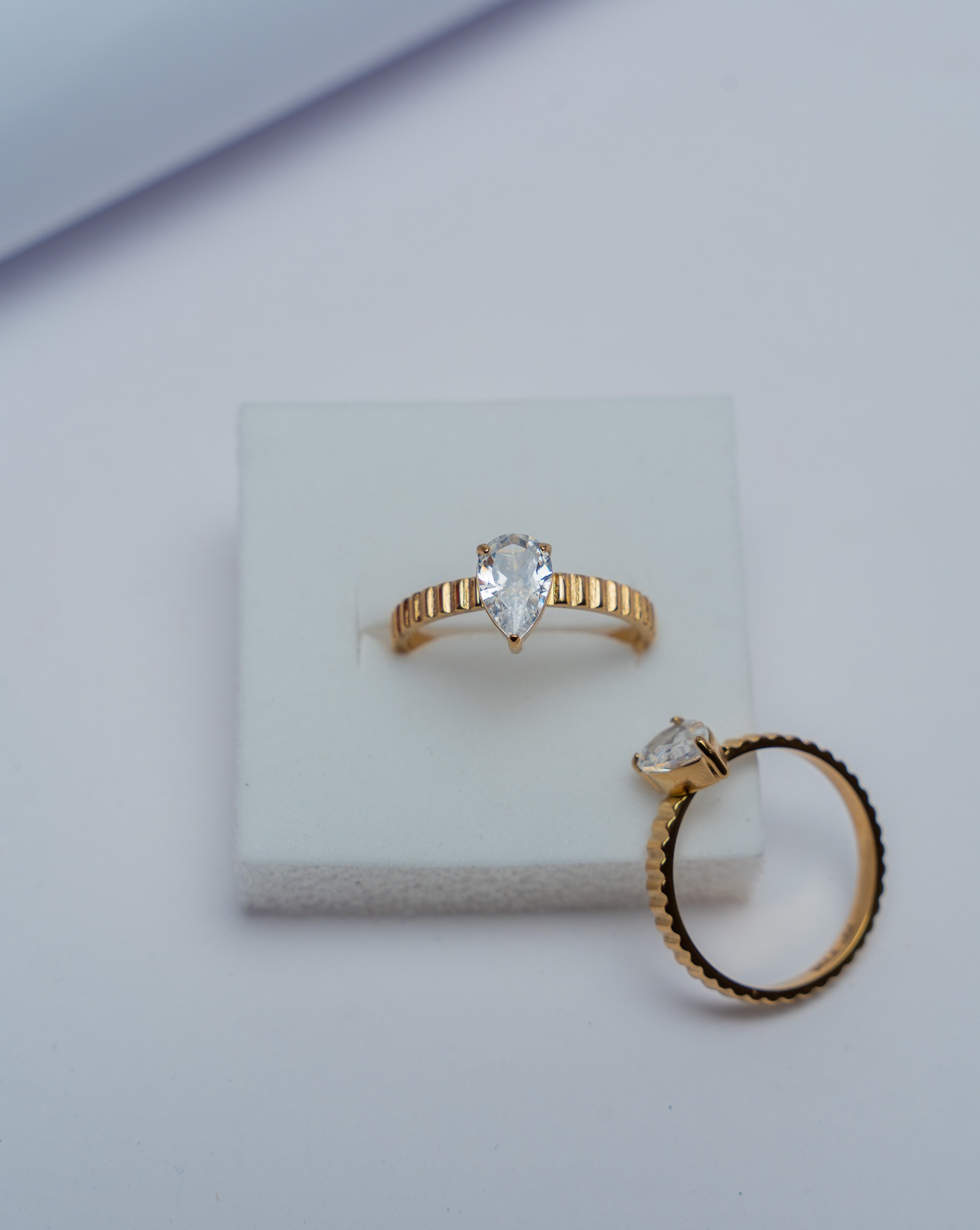 Gold Pear-Cut Crystal Solitaire Ring