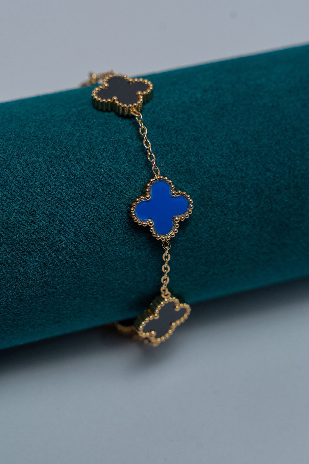 Gold-Tone Van Cleef Charm Bracelet with Blue Enamel