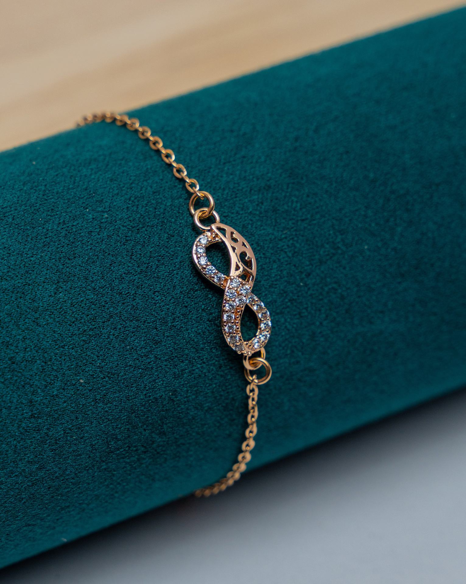 Gold-Tone Infinity Bracelet with Crystal Pavé