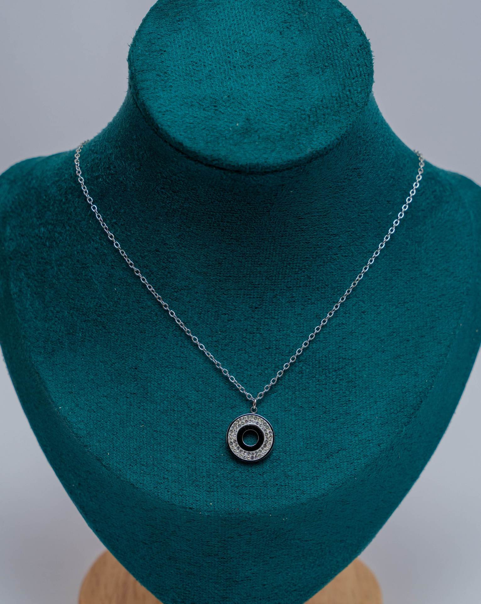 Silver Circle Pendant Necklace with Black Stone