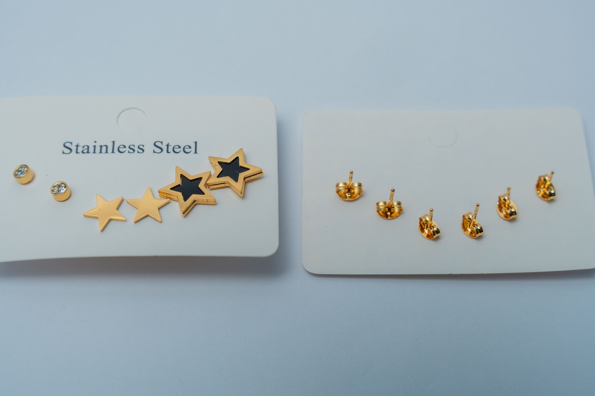 Gold-Tone Stainless Steel Star & Swan Stud Earring Set