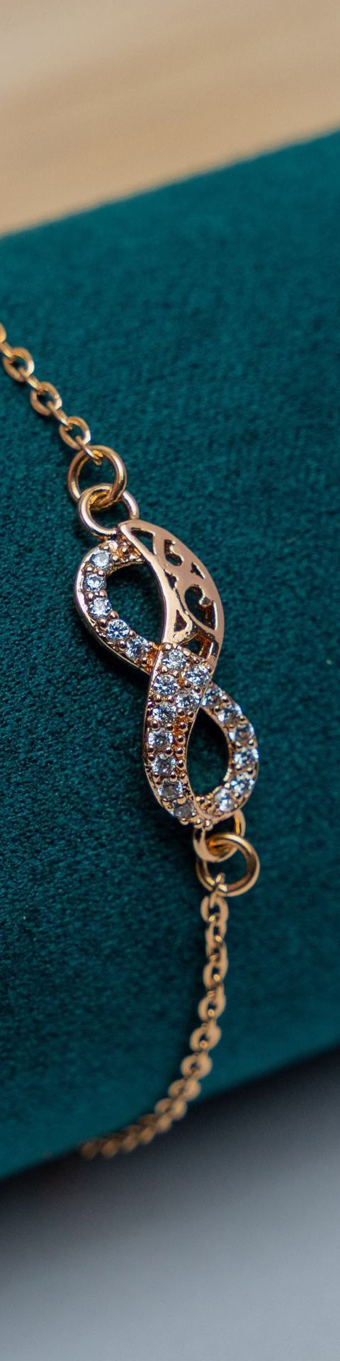 Gold-Tone Infinity Bracelet with Crystal Pavé