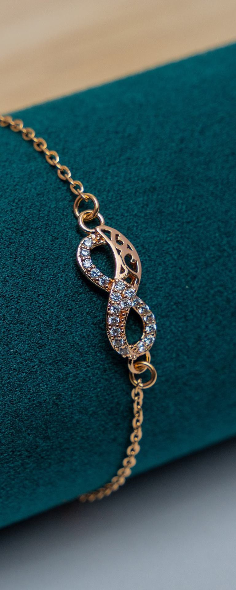 Gold-Tone Infinity Bracelet with Crystal Pavé
