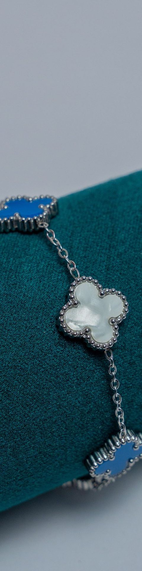 Silver Van Cleef Chain Bracelet with Blue and White Stone
