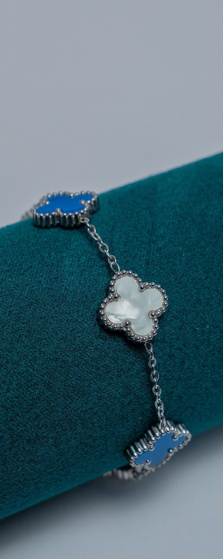 Silver Van Cleef Chain Bracelet with Blue and White Stone
