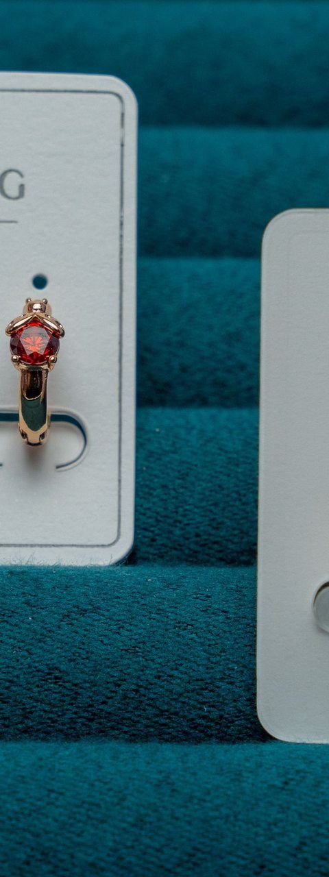 Gold-Tone Hoop Earrings with Red Crystal