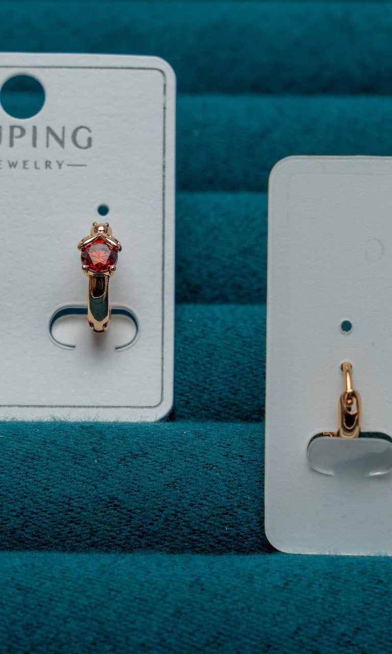 Gold-Tone Hoop Earrings with Red Crystal