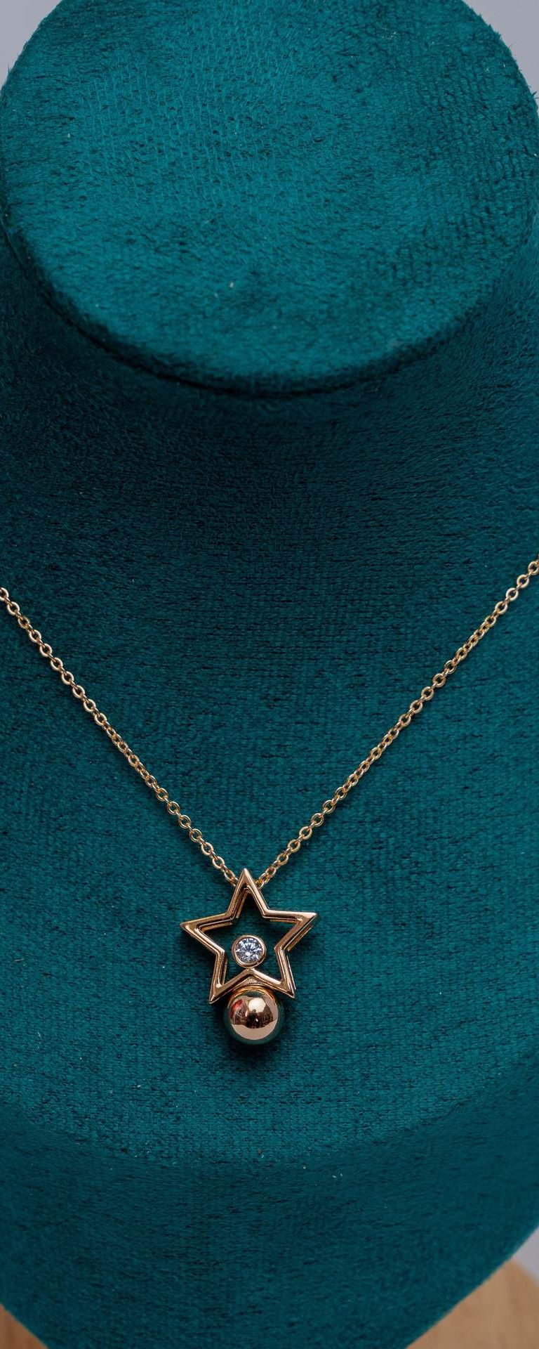 Gold-Tone Star Pendant Necklace