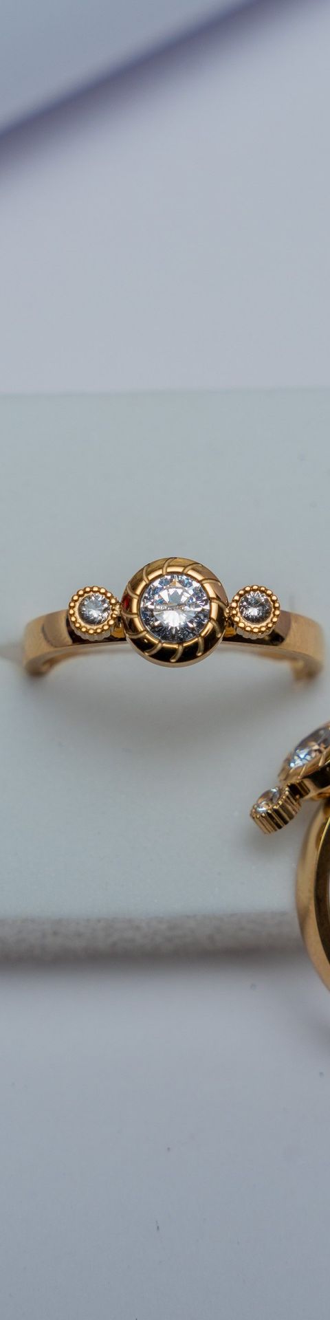 Gold Bezel Three-Stone Diamond Ring
