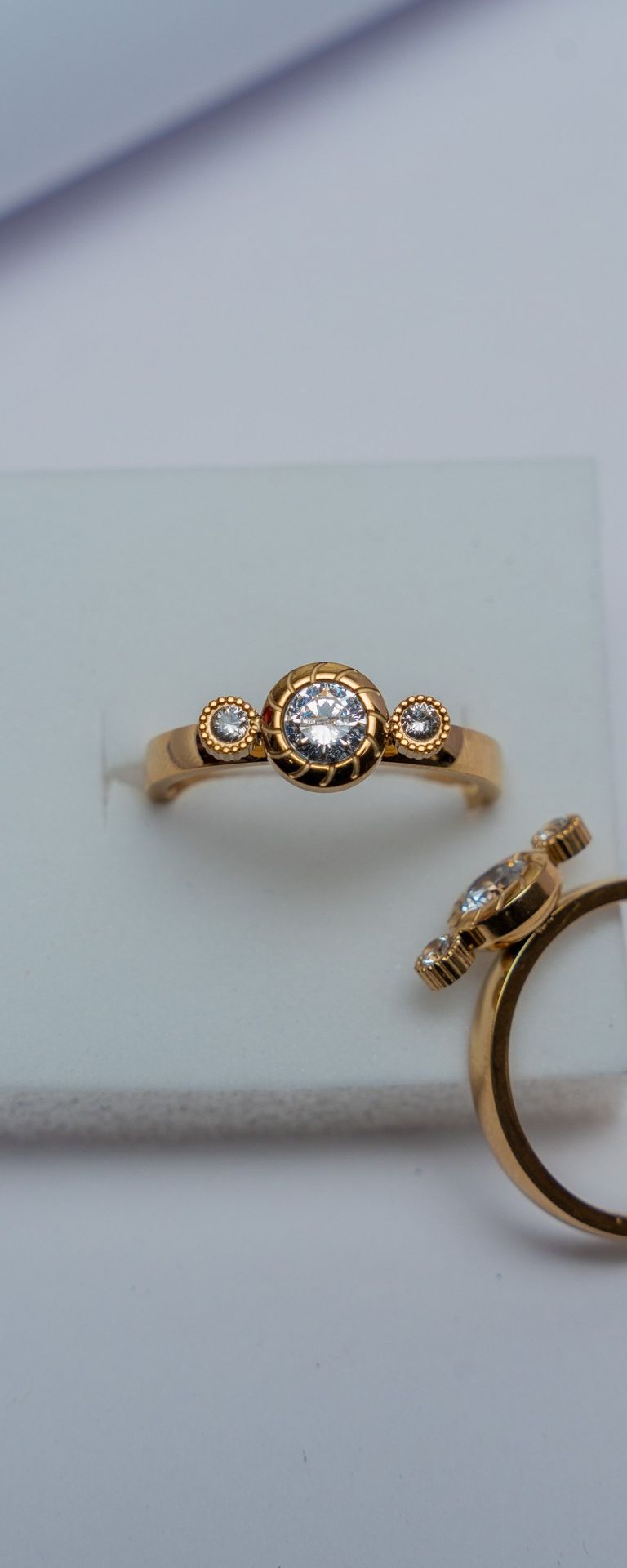 Gold Bezel Three-Stone Diamond Ring