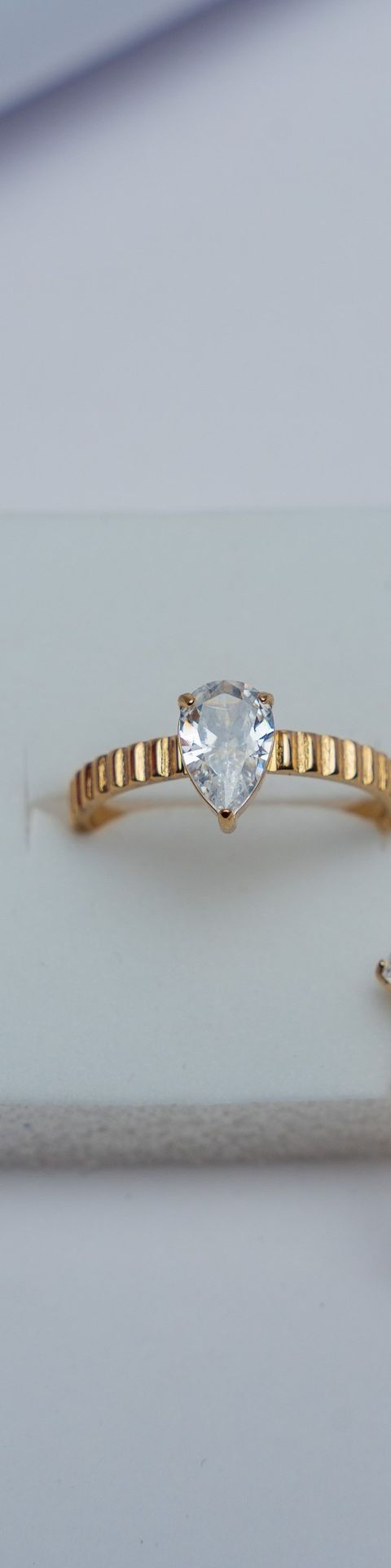 Gold Pear-Cut CZ Solitaire Ring